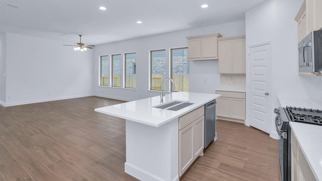 Furnished interior view inside a new home in Woodhavyn, Magnolia (Image 6).