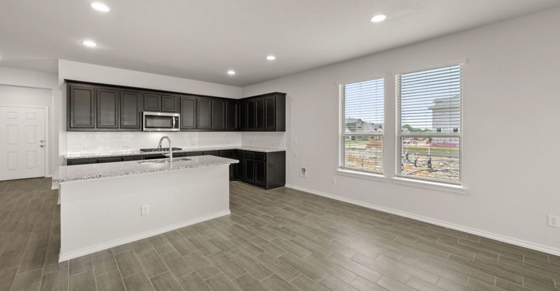 Representative exterior photo of a completed home built from the Brewer by Impression Homes in Redden Farms, Midlothian, TX (Image 11). Representative exterior photo of a completed home built from the Brewer by Impression Homes in Redden Farms, Midlothian, TX (Image 11).