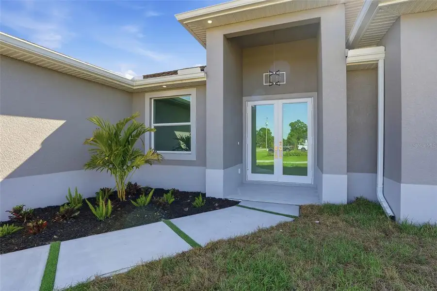 Exterior details and patio area of a home in , Lehigh Acres (Image 3).