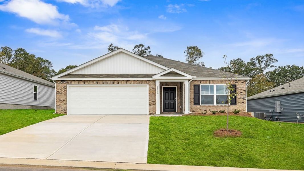 Front exterior of a new home in Harrier Point, Woodruff, SC, highlighting curb appeal (Image 1). Front exterior of a new home in Harrier Point, Woodruff, SC, highlighting curb appeal (Image 1).