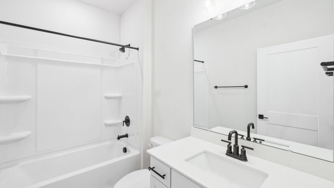 Representative furnished interior of a home built from the Sycamore by D.R. Horton in Westport, York (Image 11).