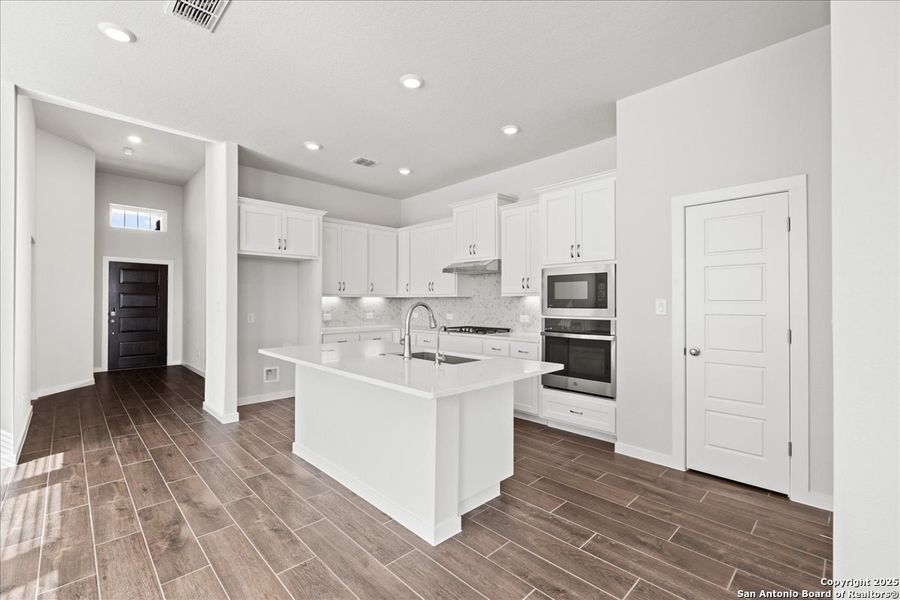 Furnished interior view inside a new home in Village at Three Oaks, Seguin (Image 8). Furnished interior view inside a new home in Village at Three Oaks, Seguin (Image 8).