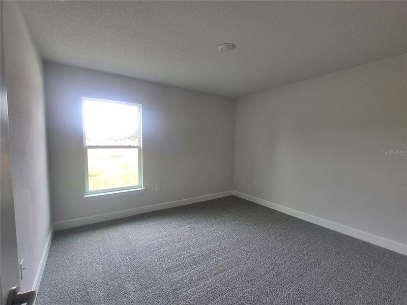 Spacious, unfurnished interior of a new home in Hill Country Estates, Dade City (Image 23).