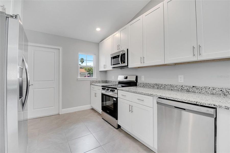 Furnished interior view inside a new home in , Kissimmee (Image 6).