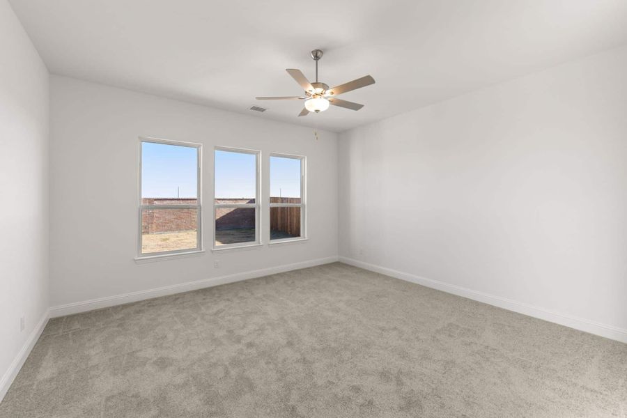 Representative unfurnished interior of a home built from the Belton by UnionMain Homes in Lake Breeze, Lavon (Image 24).
