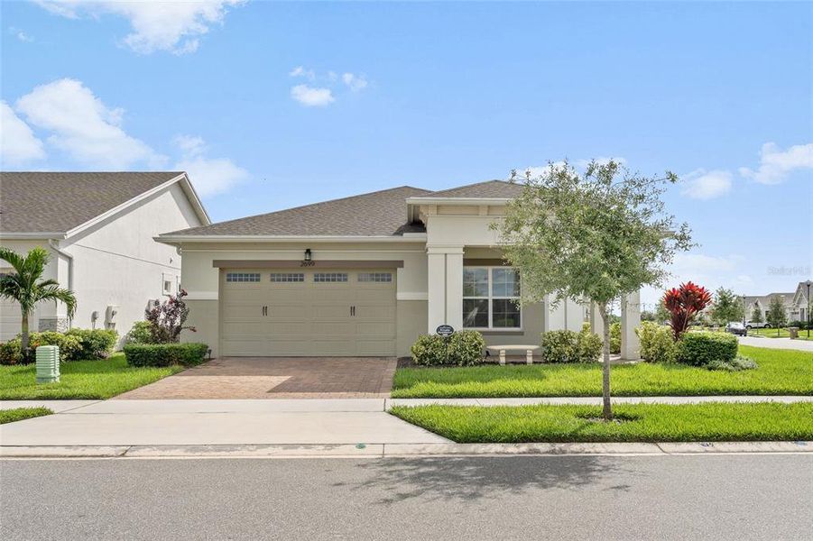 Front exterior of a new home in , St. Cloud, FL, highlighting curb appeal (Image 24).