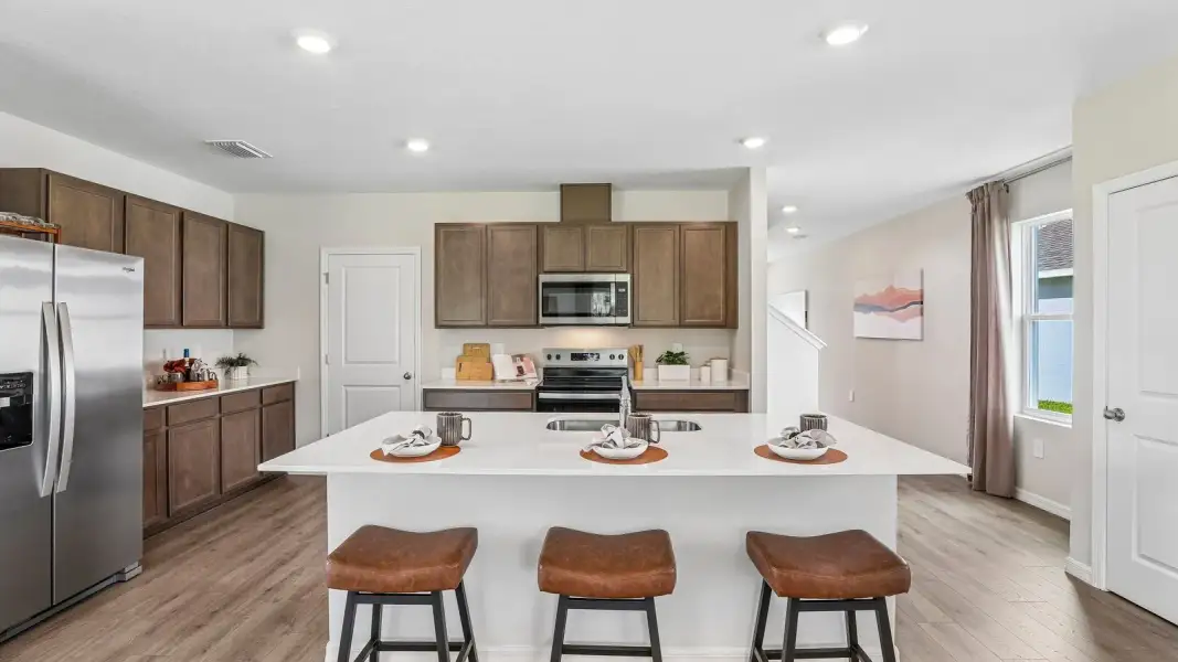 Furnished interior view inside a new home in Farm at Varrea, Plant City (Image 13).