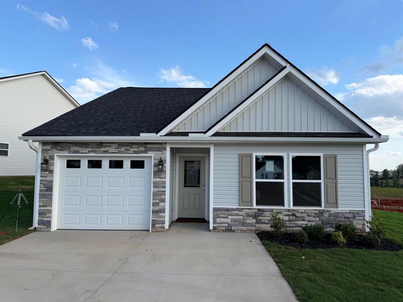 Front exterior of a new home in Cleveland Meadows, Spartanburg, SC, highlighting curb appeal (Image 1). Front exterior of a new home in Cleveland Meadows, Spartanburg, SC, highlighting curb appeal (Image 1).