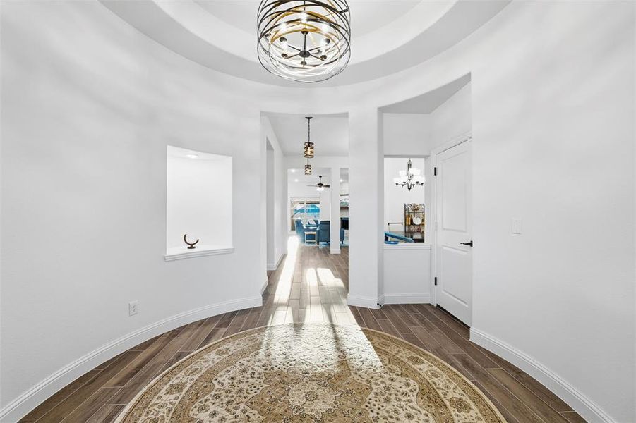 View from rotunda to living and dining area is sunny and bright View from rotunda to living and dining area is sunny and bright