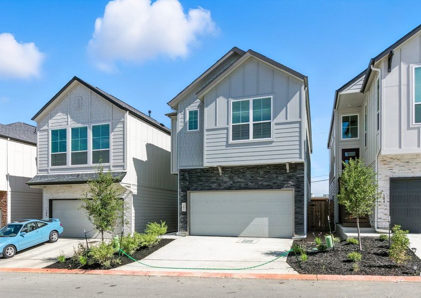 Front exterior of a new home in Rose Hill, San Antonio, TX, highlighting curb appeal (Image 16).