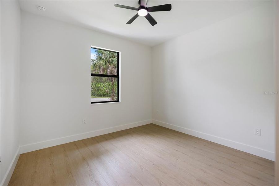 Spacious, unfurnished interior of a new home in , Port Charlotte (Image 12).