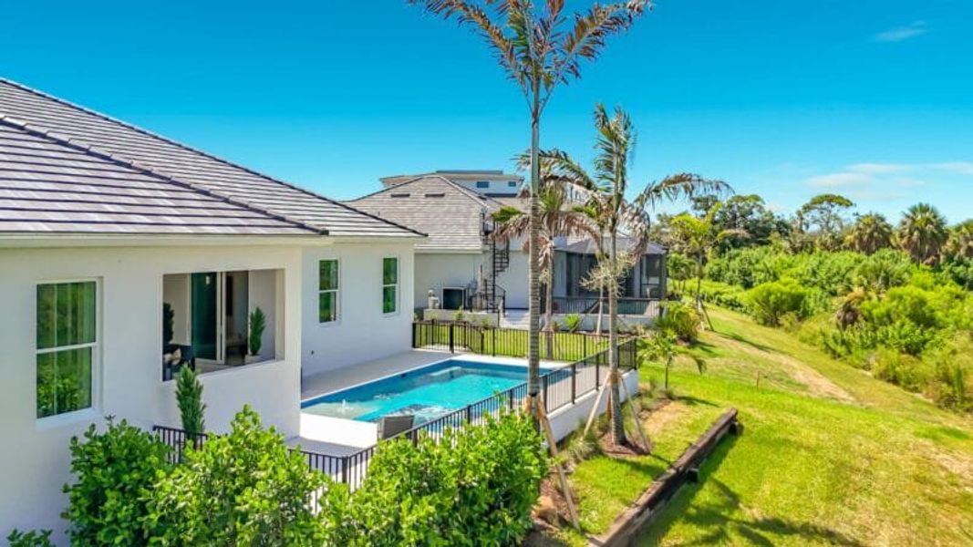 Exterior details and patio area of a home in Legends Bay, Bradenton (Image 24).