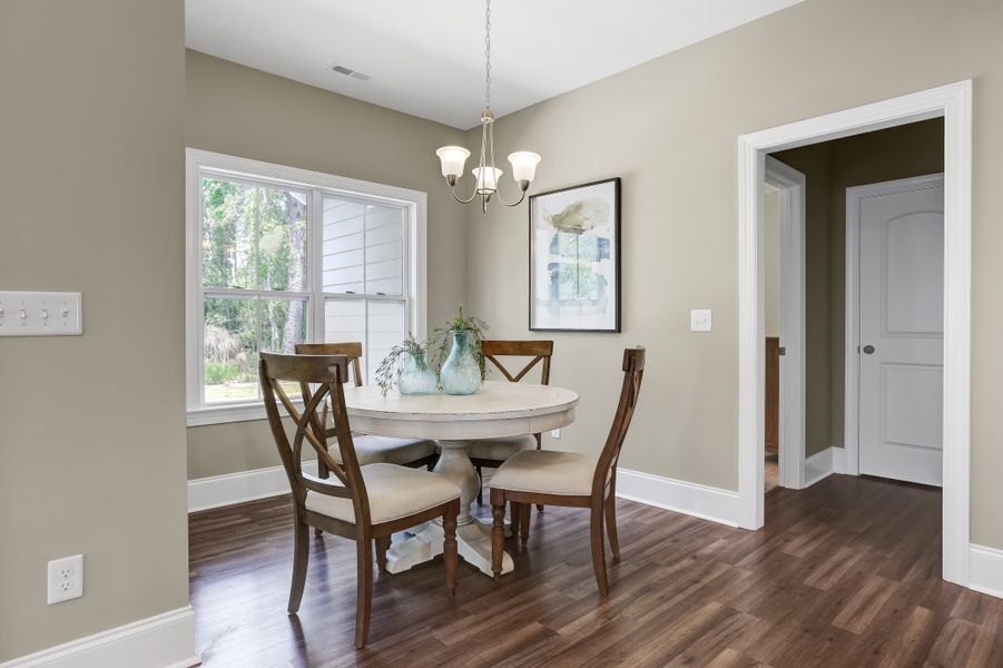 Representative furnished interior of a home built from the Sinclair by Bill Clark Homes in Osprey Landing, Southport (Image 13).
