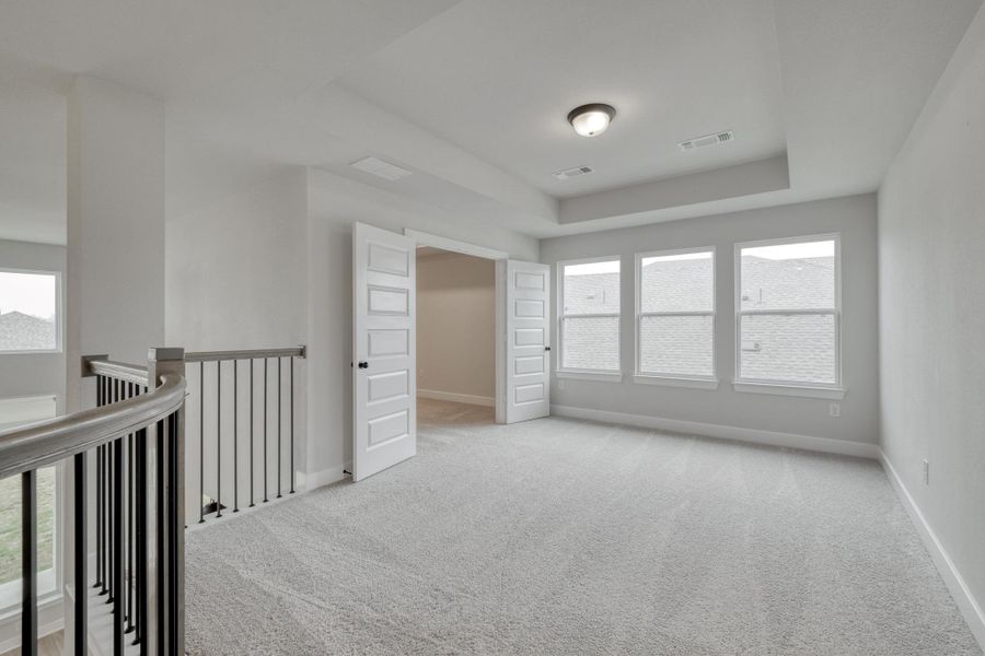 Spacious, unfurnished interior of a new home in The Colony, Bastrop (Image 15).