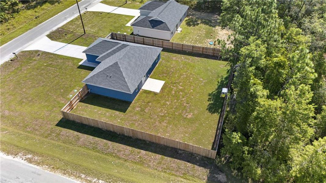 Front exterior of a new home in , Ocklawaha, FL, highlighting curb appeal (Image 23).