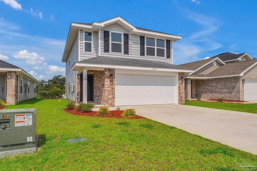 Front exterior of a new home in Allison Acres, Cantonment, FL, highlighting curb appeal (Image 2). Front exterior of a new home in Allison Acres, Cantonment, FL, highlighting curb appeal (Image 2).
