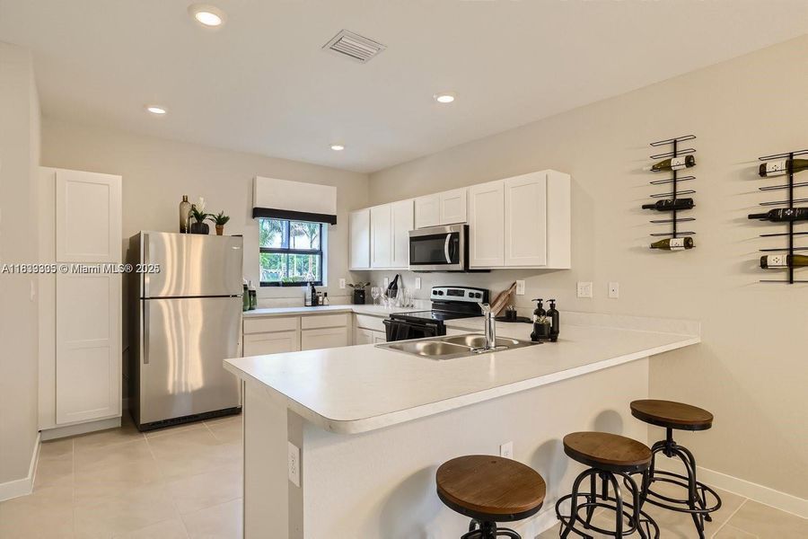 Furnished interior view inside a new home in , Florida City (Image 8). Furnished interior view inside a new home in , Florida City (Image 8).