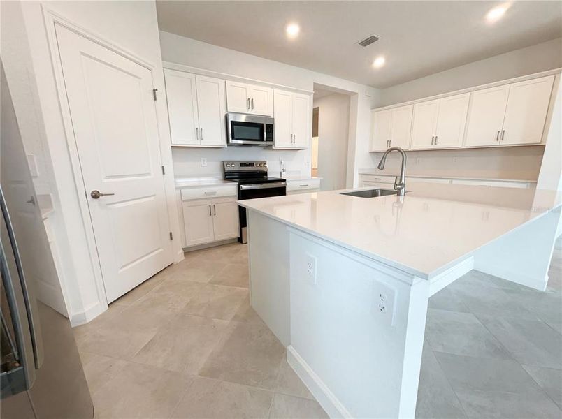 Furnished interior view inside a new home in Harbor East, Port Charlotte (Image 7).