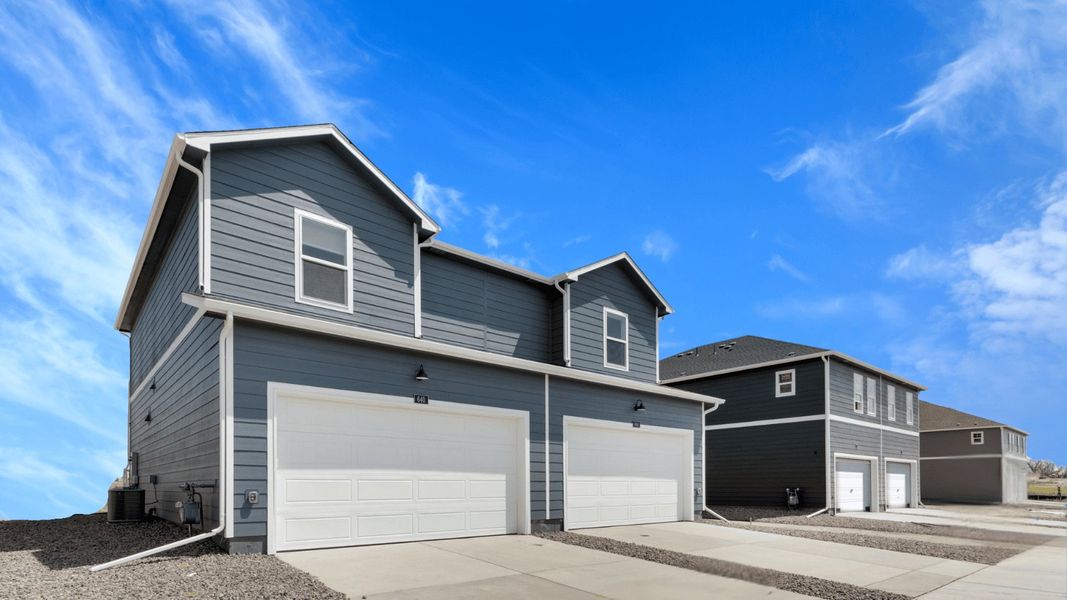 Representative exterior photo of a completed home built from the PALMER by D.R. Horton in Vista Meadows, Fort Lupton, CO (Image 2).