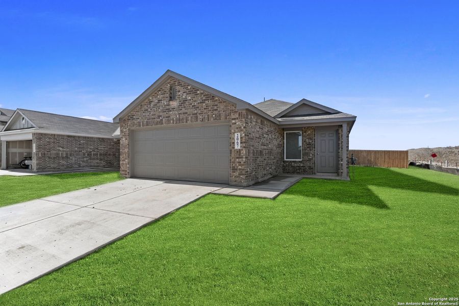 Front exterior of a new home in Randolph Crossing: Cottage Collection, Converse, TX, highlighting curb appeal (Image 1). Front exterior of a new home in Randolph Crossing: Cottage Collection, Converse, TX, highlighting curb appeal (Image 1).