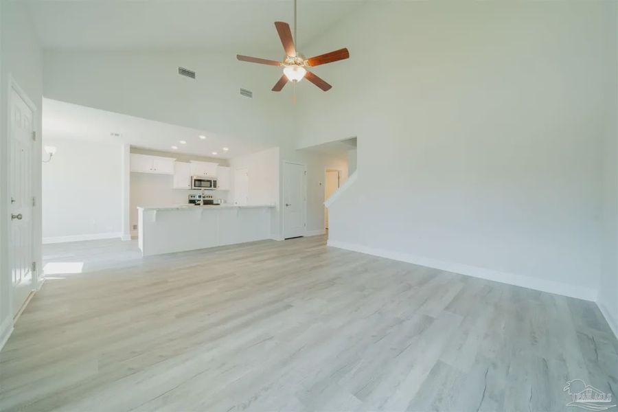 Representative unfurnished interior of a home built from the Plan 1645 by Adams Homes in Westpointe Place, Pensacola (Image 5).