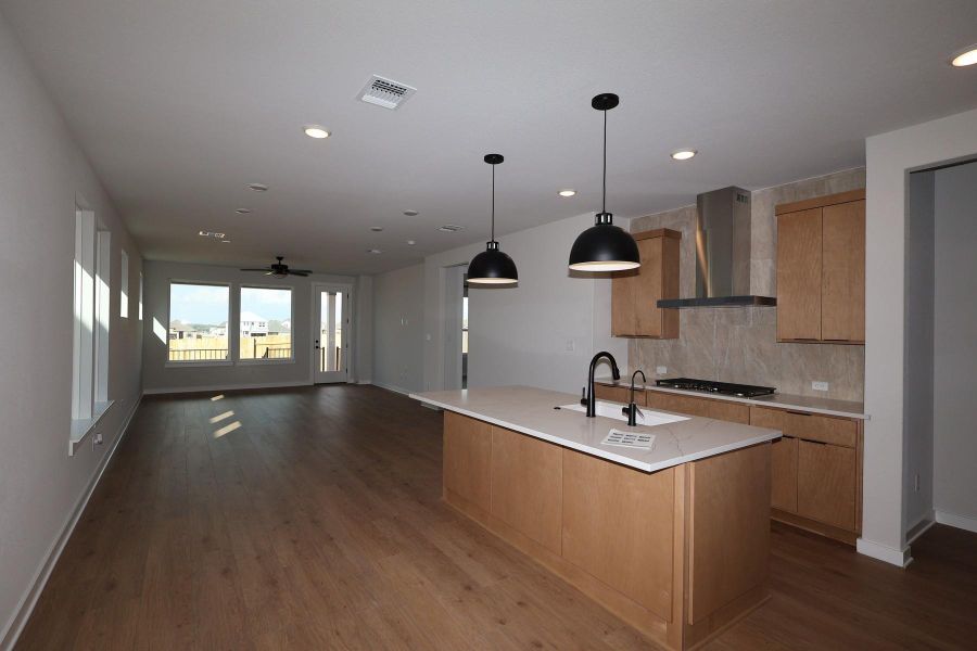 Furnished interior view inside a new home in Lariat, Liberty Hill (Image 6). Furnished interior view inside a new home in Lariat, Liberty Hill (Image 6).