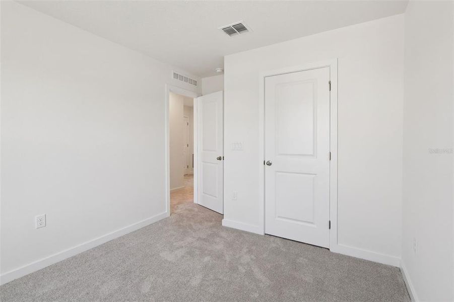 Spacious, unfurnished interior of a new home in Cyrene at Harmony, St. Cloud (Image 19).