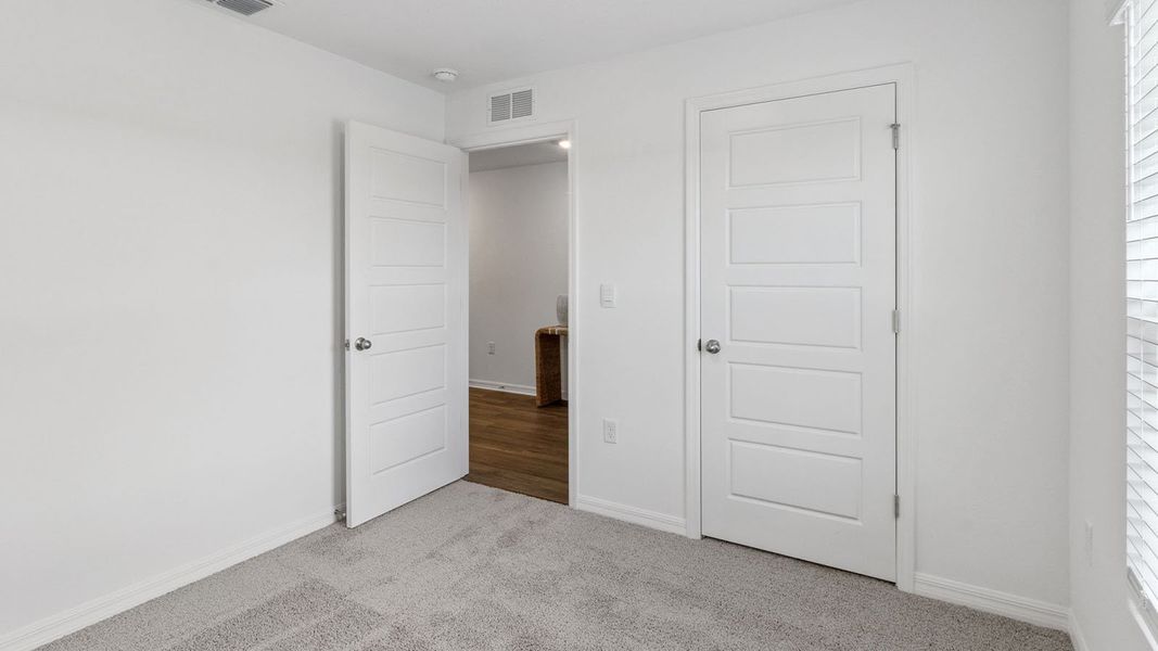Representative unfurnished interior of a home built from the Dundee by D.R. Horton in Leoma's Landing, Lake Wales (Image 20).
