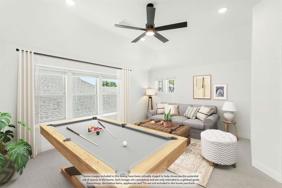 Game room with pool table, gray sofa, ceiling fan, and large windows with natural light