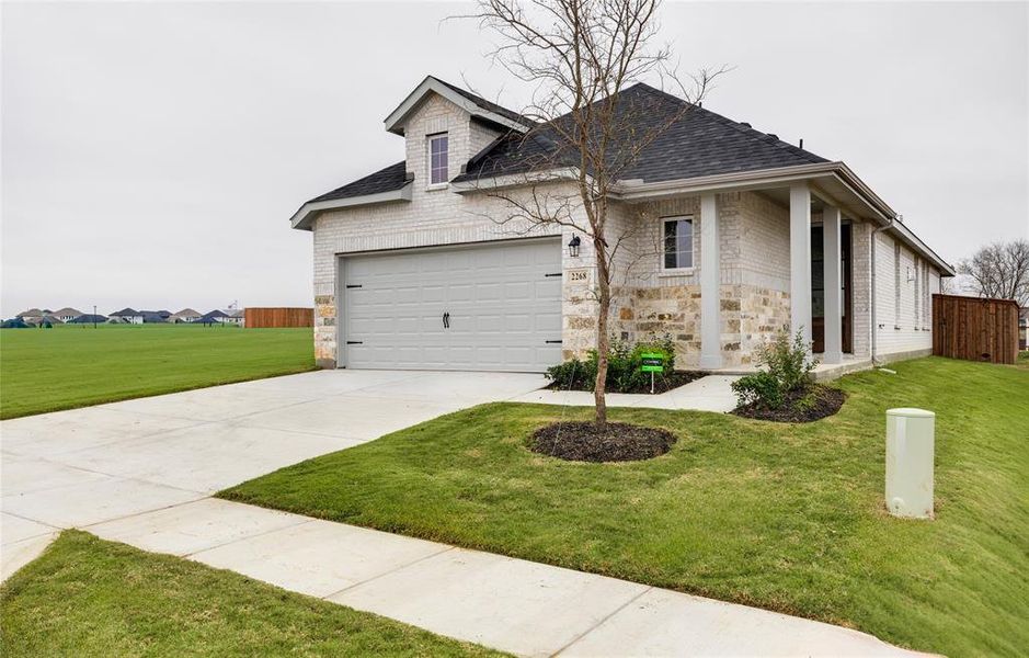 Front exterior of a new home in , Royse City, TX, highlighting curb appeal (Image 17).
