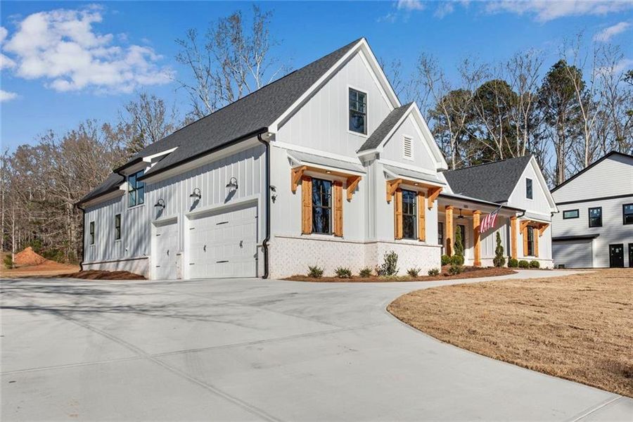Front exterior of a new home in , Hiram, GA, highlighting curb appeal (Image 29).