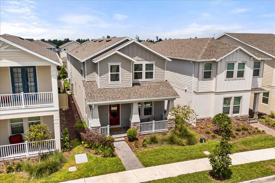 Front exterior of a new home in , Winter Garden, FL, highlighting curb appeal (Image 21).