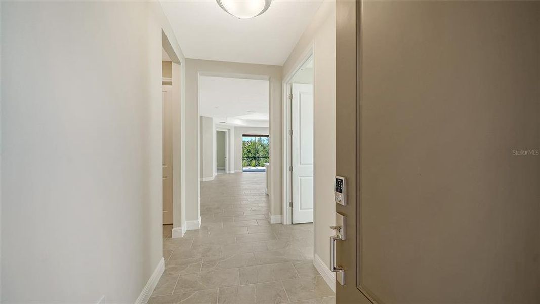 Spacious, unfurnished interior of a new home in Vicenza Real Estate and Homes for Sale in North Venice, FL - Neal Communities, Nokomis (Image 28).