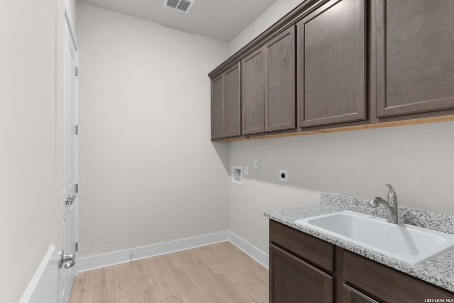 Furnished interior view inside a new home in Davis Ranch, San Antonio (Image 8).