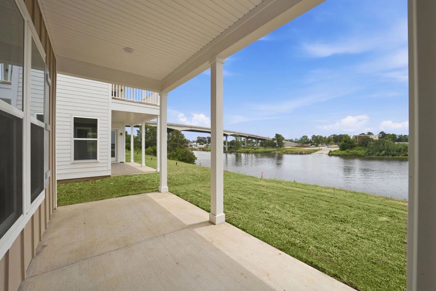 Exterior details and patio area of a home in Blue Heron Retreat, Little River (Image 3).