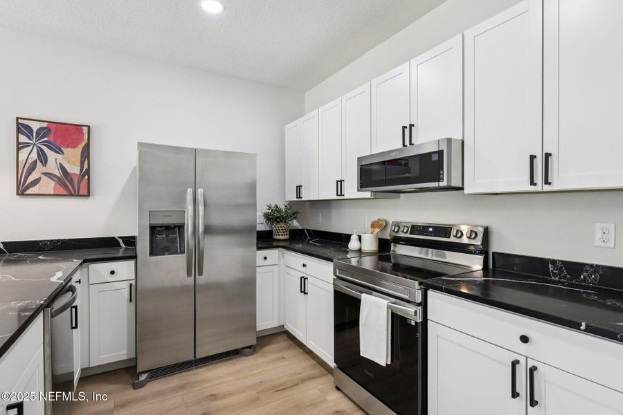 Furnished interior view inside a new home in , Jacksonville (Image 8).