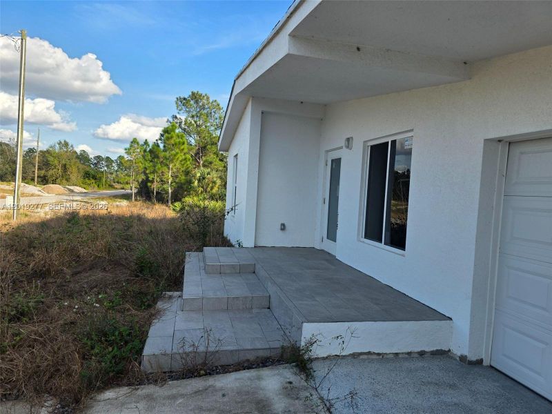 Exterior details and patio area of a home in , Lehigh Acres (Image 3).