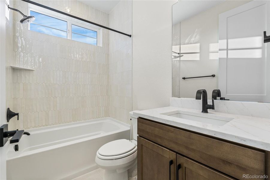 Furnished interior view inside a new home in Luxe at The Canyons, Castle Pines (Image 11).