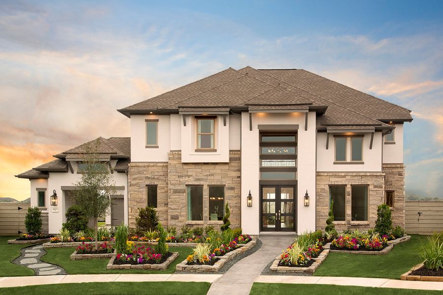 Front exterior of a new home in Harvest Green, Richmond, TX, highlighting curb appeal (Image 1). Front exterior of a new home in Harvest Green, Richmond, TX, highlighting curb appeal (Image 1).