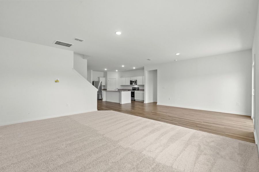Representative unfurnished interior of a home built from the Sagan by Starlight Homes in Cottonwood Creek, San Marcos (Image 14).