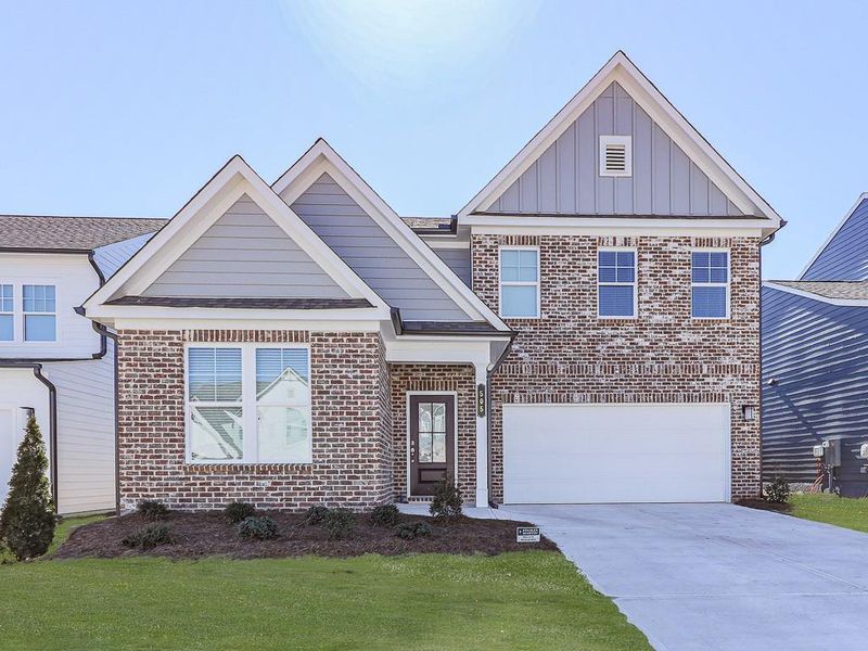 Front exterior of a new home in Kingsley, Acworth, GA, highlighting curb appeal (Image 28).