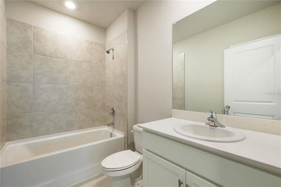 Furnished interior view inside a new home in Coral Lakes - Tradition & Express, Punta Gorda (Image 8). Furnished interior view inside a new home in Coral Lakes - Tradition & Express, Punta Gorda (Image 8).