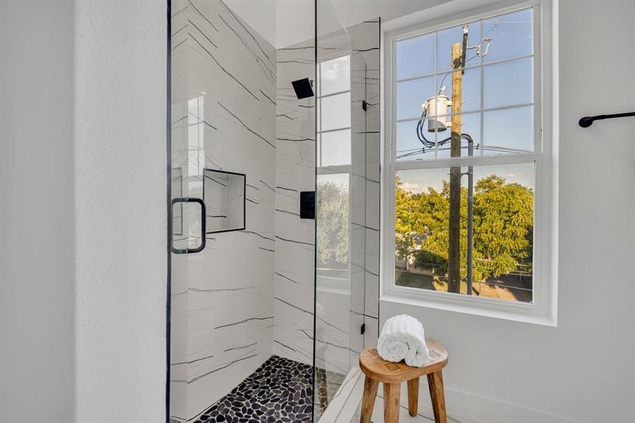 Bathroom featuring walk in shower