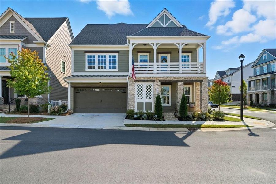 Front exterior of a new home in , Woodstock, GA, highlighting curb appeal (Image 1).