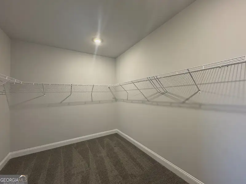 Spacious, unfurnished interior of a new home in Tuscany Hills, Douglasville (Image 22).