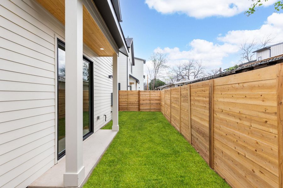View of fenced backyard