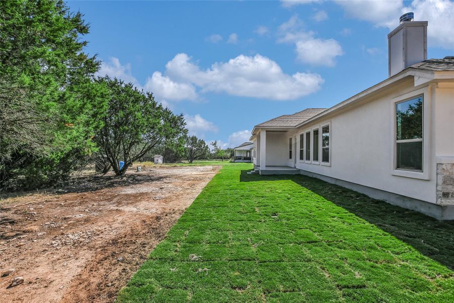 Front exterior of a new home in , Burnet, TX, highlighting curb appeal (Image 16).