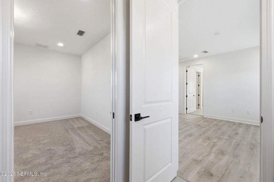 Spacious, unfurnished interior of a new home in Silver Landing At Silverleaf, St. Augustine (Image 48).