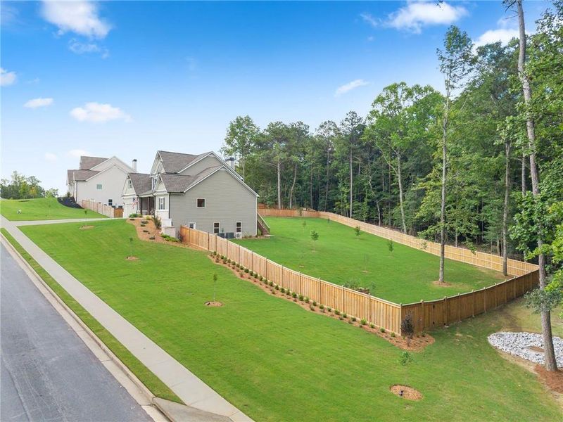 Exterior details and patio area of a home in Woodland Hills, Loganville (Image 33). Exterior details and patio area of a home in Woodland Hills, Loganville (Image 33).