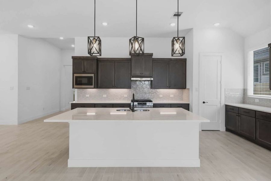 Representative furnished interior of a home built from the Palmer by Chesmar Homes in Riceland Alley Loads, Mont Belvieu (Image 7).